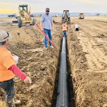 Constructin Workers installing underground utilities in Pas Robles CA
