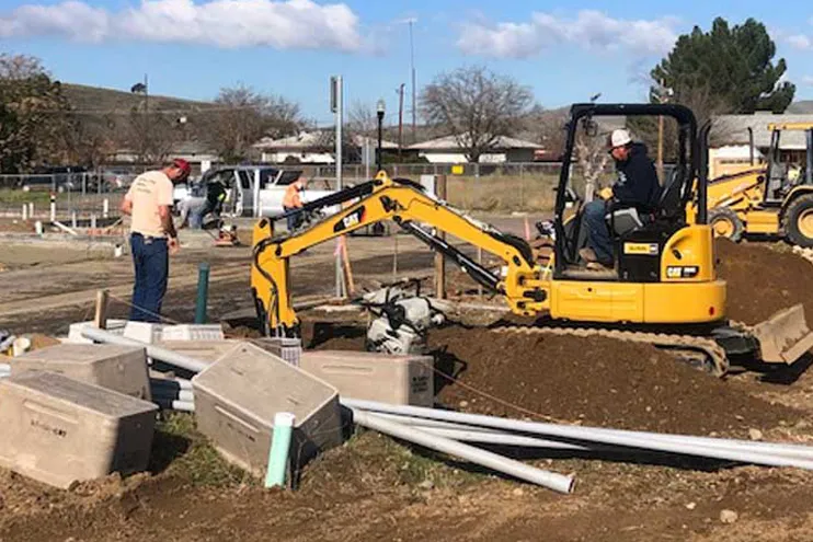 Construction crew underground utility installation california Construction crew underground utility installation california