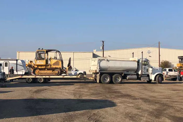 Wilber Construction Construction Equipment being transported in California Wilber Construction Construction Equipment being transported in California