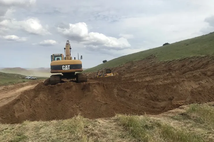 Wilber Construction Earthworking and Excavation CAT on a dirt pile Wilber Construction Earthworking and Excavation CAT on a dirt pile
