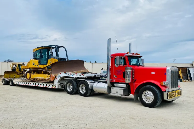 Wilber Construction Earthworking and Excavation Equiptment on Large Trailer Paso Robles California Wilber Construction Earthworking and Excavation Equiptment on Large Trailer Paso Robles California
